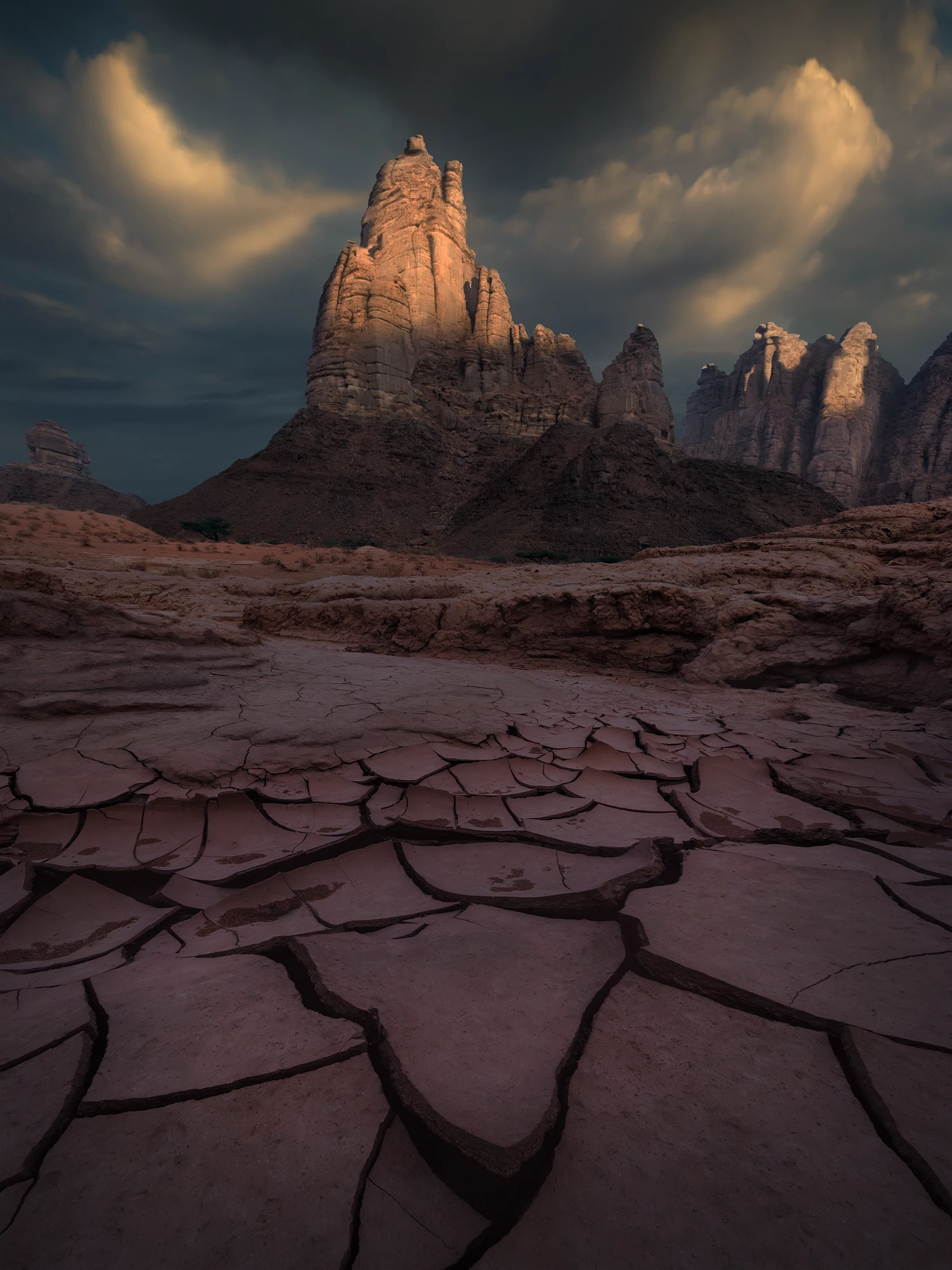 Towering sandstone rock formations and desert textures in Tabuk, Saudi Arabia under soft morning light