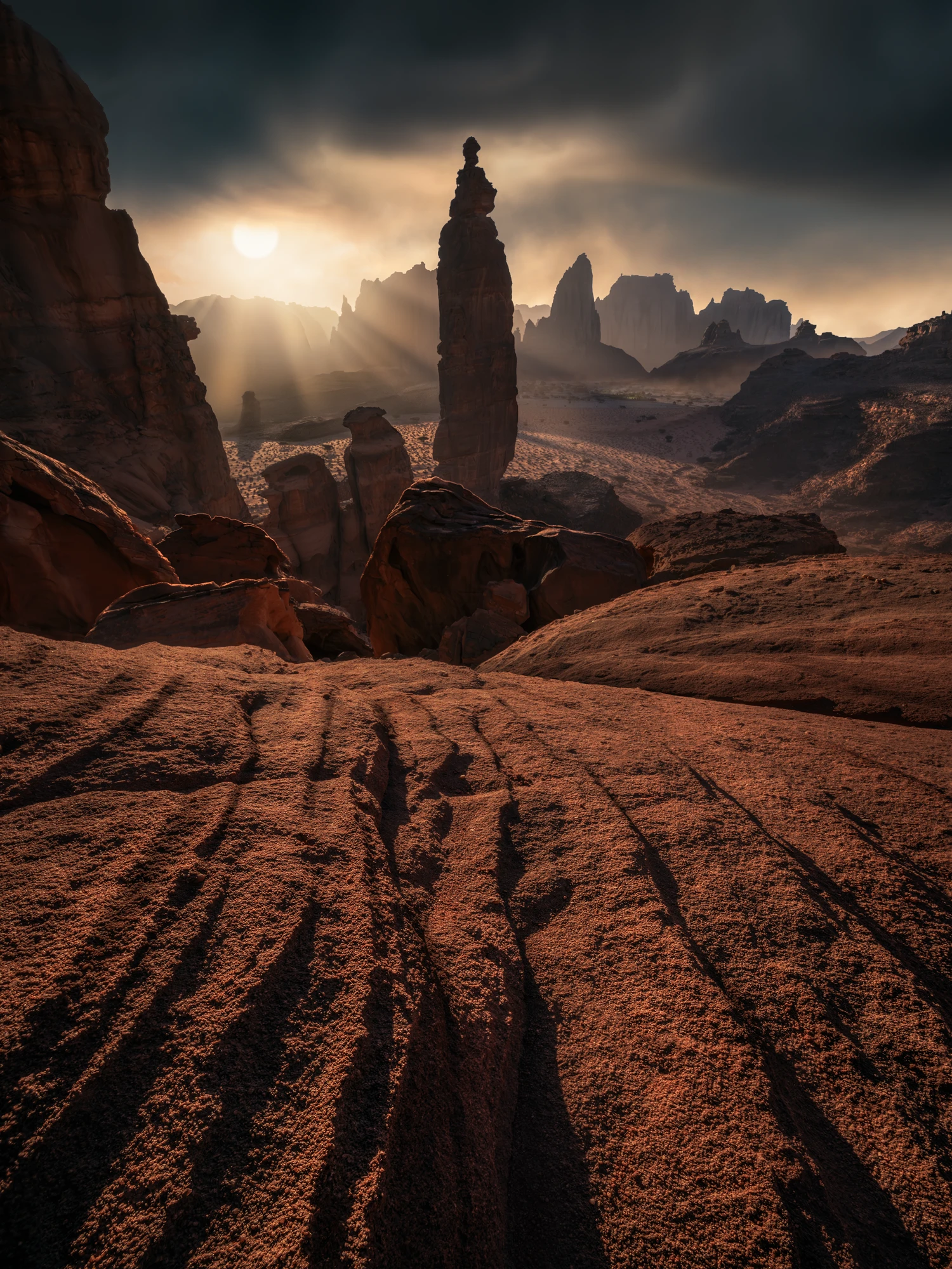 Desert Spire rock formation at sunrise in Al Disah Valley, Tabuk, Saudi Arabia – dramatic sandstone desert landscape.